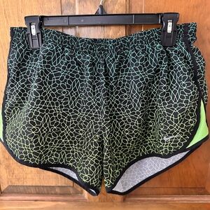 Nike Women's Black and Green Patterned Athletic Shorts
